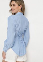 Niebieska Koszula z Usztywnionymi Ramionami Ozdobiona Sznurkiem Meroriela. Niebieskie koszule damskie Born2be, uniwersalny, bez wzorów, z jeansu, eleganckie, bez kołnierzyka, bez ramiączek. Za 89.99 zł.