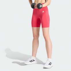 Krótkie legginsy Optimé Essentials Stash Pocket 7-Inch. Zielone legginsy damskie Adidas, xs, bez wzorów, z elastanu, z podwyższonym stanem, krótkie, do biegania. Za 149.00 zł.