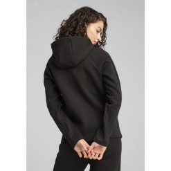 Damska rozpinana bluza z kapturem EVOSTRIPE PUMA Black. Czarne bluzy damskie Puma, s, bez wzorów, sportowe, bez ramiączek, z kapturem. W wyprzedaży za 154.00 zł.