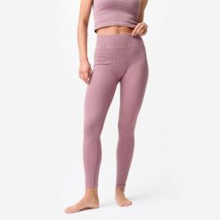 Legginsy do jogi i pilatesu damskie Domyos seamless. Fioletowe legginsy damskie DOMYOS, bez wzorów, z elastanu. Za 129.99 zł.