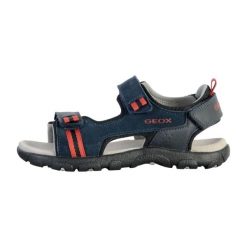 Sandały GEOX JR SANDAL STRADA A Niebieski. Niebieskie sandały męskie Geox, na lato, bez wzorów, ze skóry, bez zapięcia. Za 152.99 zł.