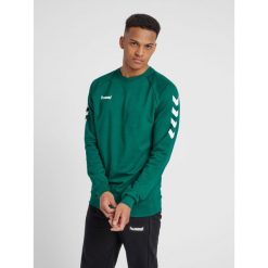 Bluza do piłki ręcznej męska Hummel Go Cotton Sweatshirt. Brązowe bluzy męskie Hummel, m, bez wzorów, sportowe, bez ramiączek, bez kaptura. W wyprzedaży za 152.50 zł.
