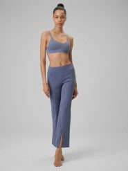 4F Spodnie do jogi z rozszerzanymi nogawkami damskie - niebieskie L. Niebieskie spodnie dresowe damskie 4F, bez wzorów, ze skóry, sportowe, długie. Za 169.99 zł.