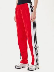 Adidas Spodnie dresowe Adibreak JY1354 Czerwony Loose Fit. Czerwone spodnie dresowe damskie Adidas, bez wzorów, z dresówki. Za 249.99 zł.
