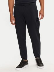 Armani Exchange Spodnie dresowe 6DZPJA ZJNKZ 1510 Granatowy Regular Fit. Niebieskie spodnie sportowe męskie Armani Exchange, m, bez wzorów, z bawełny. Za 529.99 zł.