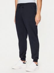 Tommy Hilfiger Spodnie dresowe Terry MW0MW37236 Granatowy Regular Fit. Niebieskie spodnie sportowe męskie Tommy Hilfiger, m, bez wzorów, z bawełny. Za 359.99 zł.