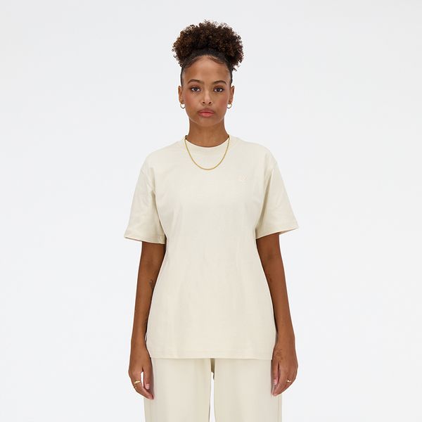 Koszulka damska New Balance WT41501LIN – beżowa. Brązowe bluzki damskie New Balance, s, bez wzorów, z materiału, eleganckie, bez kołnierzyka, bez ramiączek. Za 169.99 zł.