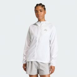 Kurtka adi365 Running Essentials. Białe kurtki sportowe damskie Adidas, uniwersalny, bez wzorów, z materiału, bez ramiączek, bez kaptura, do biegania. Za 305.40 zł.