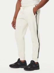 EA7 Emporio Armani Spodnie dresowe 7M000974 AF10377 U1105 Beżowy Regular Fit. Brązowe spodnie sportowe męskie EA7 Emporio Armani, l, bez wzorów, z bawełny. Za 429.99 zł.