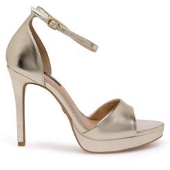 Sandały Nine West. Żółte sandały damskie Nine West, bez wzorów, bez obcasa, na szpilce, bez zapięcia. Za 183.99 zł.