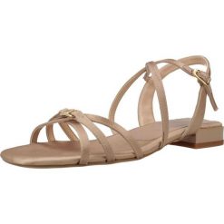 Sandały UNISA CERSI RA Beżowy. Brązowe sandały damskie Unisa, bez wzorów, ze skóry, bez obcasa, bez zapięcia. Za 463.99 zł.