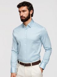 Klasyczna męska koszula SLIM FIT z satynowej tkaniny – niebieska V2 - Rozmiar: XXL. Niebieskie koszule męskie Ombre Clothing, m, bez wzorów, z bawełny, biznesowe, bez kołnierzyka, bez ramiączek. W wyprzedaży za 202.99 zł.