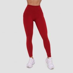 Legginsy damskie fitness z kieszeniami ciemnoczerwone Ignite. Czerwone legginsy damskie GYMBEAM, bez wzorów, z elastanu. Za 115.90 zł.