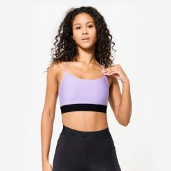 Stanik sportowy Decathlon. Fioletowe bielizna sportowa damska DOMYOS, s, bez wzorów, z elastanu. Za 49.99 zł.