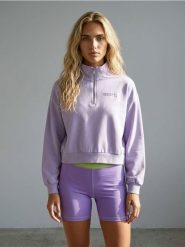Bluza half-zip z haftowanym napisem z bawełną - fioletowy. Fioletowe bluzy damskie Sinsay, l, bez wzorów, z bawełny, bez ramiączek, bez kaptura. Za 49.99 zł.