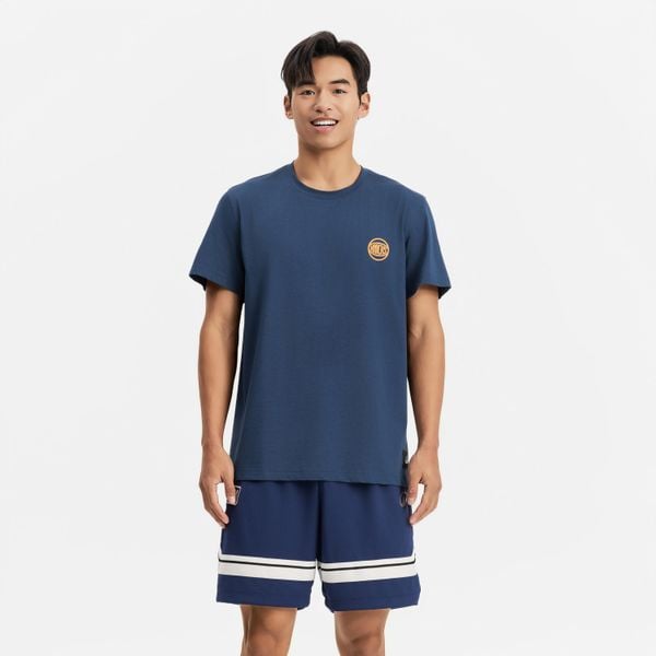 Koszulka koszykówki unisex Tarmak NBA Knicks TS 900. Niebieskie bluzki damskie TARMAK, l, bez wzorów, z bawełny, sportowe, bez kołnierzyka, bez ramiączek. Za 79.99 zł.