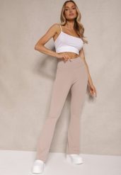 Beżowe Prążkowane Spodnie Typu Dzwony High Waist Farinia. Brązowe spodnie materiałowe damskie Renee, bez wzorów, z jeansu, z podwyższonym stanem. Za 44.99 zł.