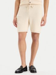 Tommy Hilfiger Szorty materiałowe MW0MW42797 Kremowy Regular Fit. Białe szorty męskie Tommy Hilfiger, bez wzorów, z bawełny. Za 529.99 zł.