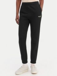 Lacoste Spodnie dresowe XF7604 Czarny Regular Fit. Czarne spodnie dresowe damskie Lacoste, bez wzorów, z dresówki. Za 569.99 zł.