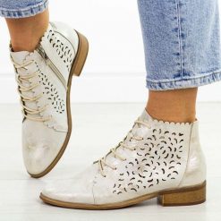 Złote ażurowe botki damskie Potocki 12646. Żółte botki damskie POTOCKI, na jesień, w ażurowe wzory, z jeansu, biznesowe, bez obcasa, na płaskiej podeszwie, bez zapięcia. Za 229.00 zł.