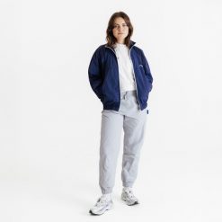 Spodnie dresowe unisex Decathlon AFLF szare. Szare spodnie dresowe damskie Decathlon, xl, bez wzorów, z dresówki, na fitness i siłownię. W wyprzedaży za 99.99 zł.
