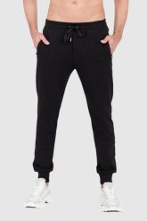 DOLCE & GABBANA Czarne spodnie dresowe z haftowanym logo. Czarne spodnie sportowe męskie Dolce and Gabbana, m, bez wzorów, z bawełny. W wyprzedaży za 2,349.99 zł.
