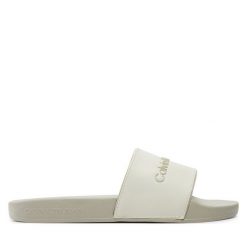 Klapki Calvin Klein Jeans. Klapki damskie Calvin Klein Jeans, bez wzorów, z jeansu, bez obcasa, bez zapięcia. Za 219.99 zł.