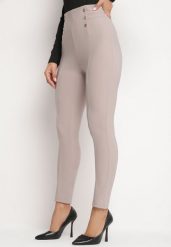 Jasnobeżowe Bawełniane Legginsy z Wysokim Stanem i Ozdobnymi Guzikami Rielina. Brązowe legginsy damskie Born2be, bez wzorów, z bawełny. Za 39.99 zł.