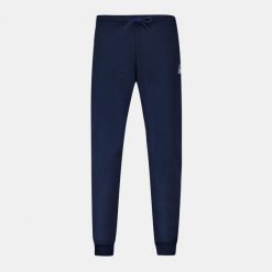 Wąskie spodnie do biegania Le Coq Sportif N°2. Niebieskie spodnie sportowe męskie le coq sportif, bez wzorów, z dresówki, do biegania. Za 319.15 zł.