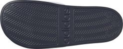 Adidas Klapki damskie adidas Adilette Shower biało-granatowe GZ5930 39. Białe klapki damskie Adidas, bez wzorów, sportowe, bez obcasa, bez zapięcia. Za 120.24 zł.