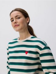 Bluza z drobnym haftem - ciemnozielony. Zielone bluzy damskie Reserved, l, bez wzorów, z bawełny, bez ramiączek, bez kaptura. W wyprzedaży za 39.99 zł.