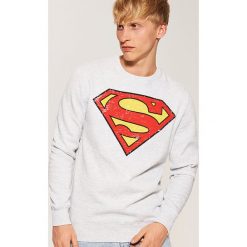 Bluza z nadrukiem Superman - Jasny szary. Szare bluzy damskie House, l, bez wzorów, bez ramiączek, bez kaptura. Za 69.99 zł.