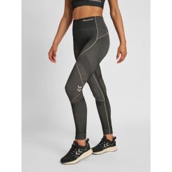 Damskie legginsy mid-rise Hummel MT Mila. Brązowe legginsy damskie Hummel, bez wzorów, z dzianiny. Za 205.35 zł.