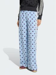 Adidas Spodnie dresowe Satin Polka Dots Wide Leg Pant KV1170 Niebieski jasny Relaxed Fit. Niebieskie spodnie dresowe damskie Adidas, bez wzorów, z dresówki. Za 298.99 zł.