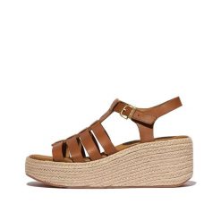 Klapki na koturnie w stylu rybaka damskie FitFlop Platfforms. Brązowe klapki damskie FIT FLOP, na lato, bez wzorów, eleganckie, bez obcasa, na koturnie, bez zapięcia. Za 658.00 zł.