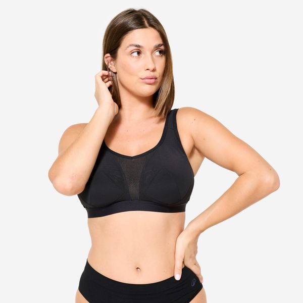 Stanik sportowy Decathlon. Czarne bielizna sportowa damska Decathlon, bez wzorów, z elastanu, bez zapięcia, na fitness i siłownię. Za 79.99 zł.