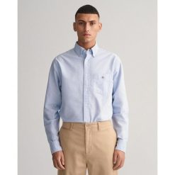 Koszula Gant Classic Oxford. Niebieskie koszule męskie GANT, m, bez wzorów, z tkaniny, biznesowe, bez kołnierzyka, bez ramiączek. Za 482.25 zł.
