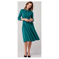 Sukienka Sotera szmaragdowa XXS zielony. Zielone sukienki damskie Marie Zélie, l, bez wzorów, z bawełny, bez kołnierzyka, bez ramiączek, dopasowane. W wyprzedaży za 138.80 zł.