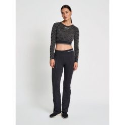 Damski crop top Hummel MT Saga. Czarne topy damskie Hummel, l, bez wzorów, sportowe, bez kołnierzyka, bez ramiączek. Za 167.00 zł.