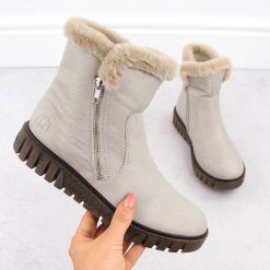 Botki damskie z futerkiem beżowe Rieker Y3481-60. Brązowe botki damskie Rieker, bez wzorów, ze skóry ekologicznej, bez obcasa, bez zapięcia. Za 389.00 zł.