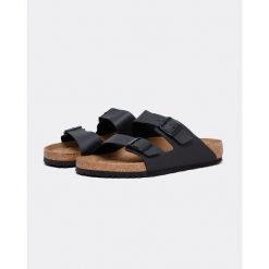 Klapki turystyczne uniseks Birkenstock Arizona 791. Czarne klapki męskie Birkenstock, bez wzorów, z materiału, bez zapięcia. Za 441.00 zł.