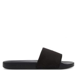 Klapki Calvin Klein Jeans. Czarne klapki damskie Calvin Klein Jeans, bez wzorów, z jeansu, bez obcasa, bez zapięcia. Za 119.99 zł.