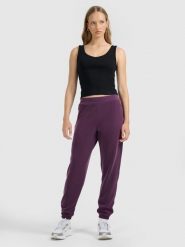 4F Spodnie dresowe joggery z modalem damskie - fioletowe S. Fioletowe spodnie dresowe damskie 4F, bez wzorów, z dresówki. Za 169.99 zł.