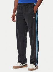 Adidas Spodnie dresowe Firebird Drop Needle KE4136 Czarny Regular Fit. Czarne spodnie sportowe męskie Adidas, m, bez wzorów, z dresówki. Za 329.99 zł.