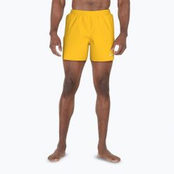 Szorty kąpielowe męskie Nike Essential 5" Volley. Czerwone kąpielówki męskie Nike, bez wzorów, sportowe. Za 79.99 zł.