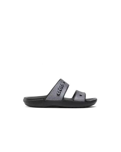 Klapki Dla Dorosłych Crocs Classic Glitter Sandal. Czarne klapki męskie Crocs, bez wzorów, z materiału, bez zapięcia. Za 99.99 zł.