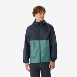 Kurtka turystyczna męska Quechua Raincut zamek wodoodporna. Niebieskie kurtki męskie QUECHUA, m, bez wzorów, z materiału, sportowe, bez kaptura. Za 69.99 zł.