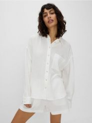 Koszula z bawełnianego muślinu - biały. Białe koszule damskie Reserved, l, bez wzorów, z bawełny, bez kołnierzyka, bez ramiączek. W wyprzedaży za 99.99 zł.