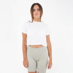 Krótkie damskie T-shirt CROPPED TEE białe. Białe t-shirty damskie Legea, bez wzorów, sportowe, bez kołnierzyka, bez ramiączek. Za 52.00 zł.