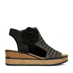 Sandały Rieker. Czarne sandały damskie Rieker, bez wzorów, bez obcasa, na koturnie, bez zapięcia. Za 359.99 zł.